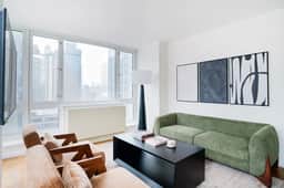 43-20A Newly furnished 1BR- full service Doorman laundry Gym Business Center - Image 2