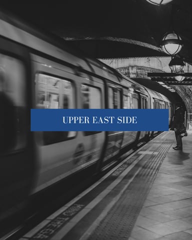 Subway train at platform with text overlay reading Upper East Side